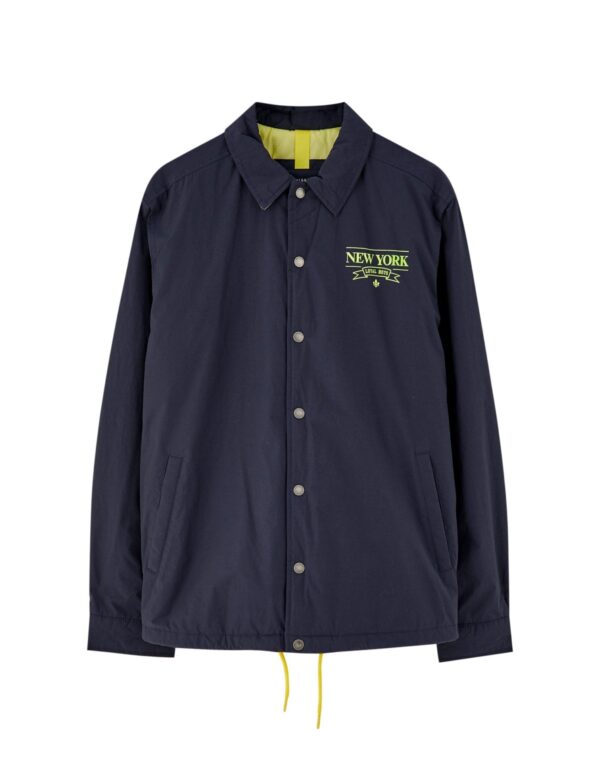 Navy blue coach jacket with neon detail